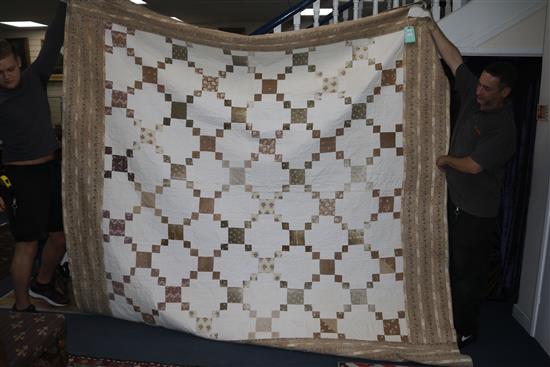 An early patchwork quilt and another